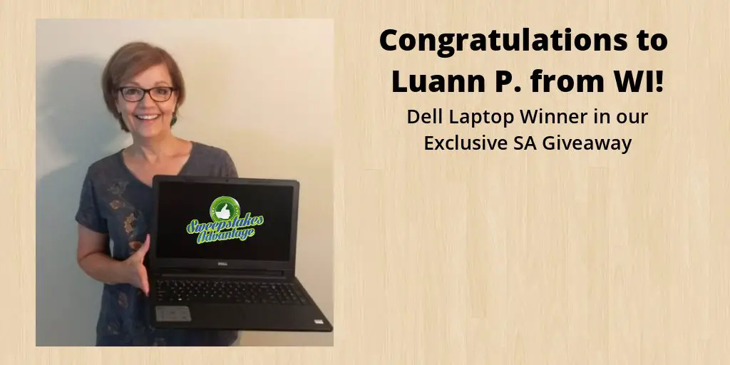 luann holding her new dell laptop prize