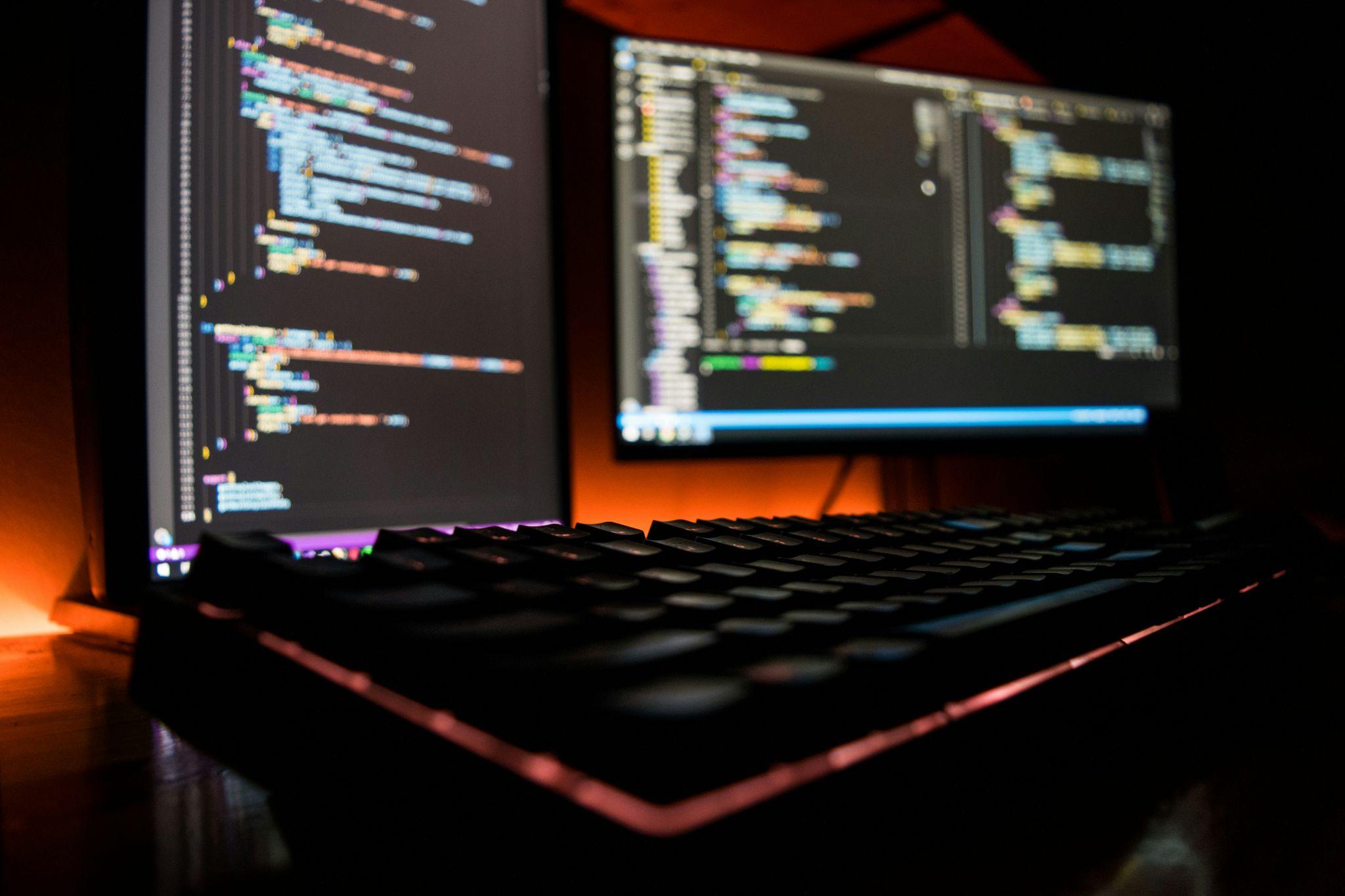 A computer screen showing complex software code or a backend system interface, representing the technical foundation when you buy poker room software.